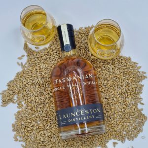 Bottle of whisky and two glasses